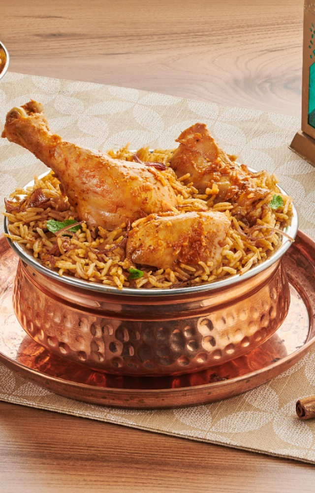 A fragrant rice delicacy layered with marinated meat, saffron, and aromatic spices. A royal feast on a plate!