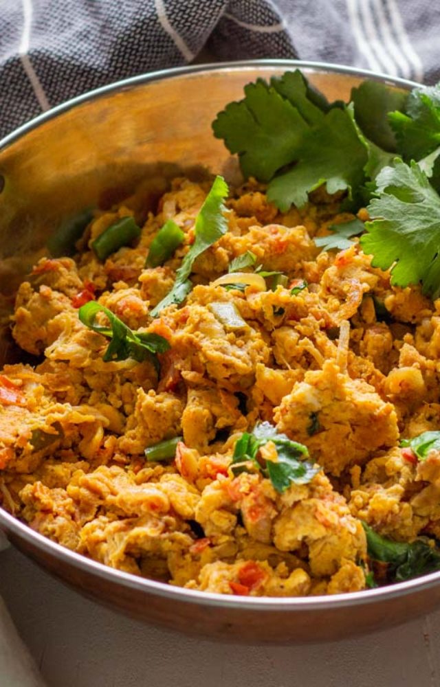 A traditional scrambled egg dish cooked with onions, tomatoes, and chilies, adding a spicy twist to your breakfast.