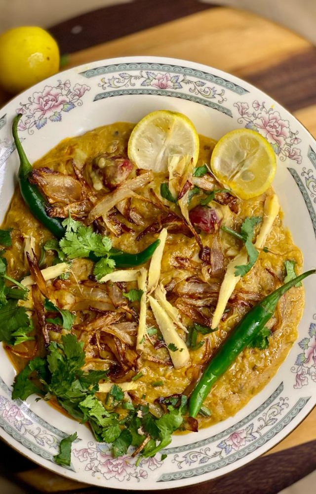 A slow-cooked stew of wheat, lentils, and meat, rich in flavor and perfect for festive occasions like Ramadan.