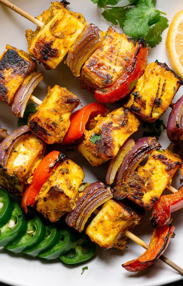 Smoky, spicy, and grilled to perfection—paneer tikka is a great vegetarian choice to pair with peaty or smoky whisky cocktails.