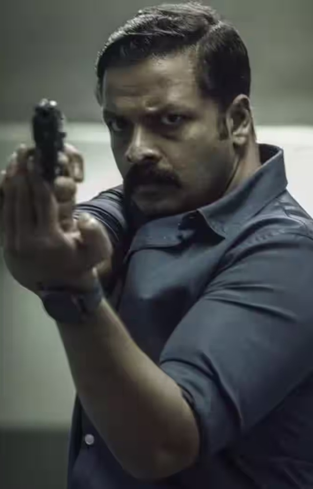 Follow the intriguing journey of a committed cop in this riveting Malayalam crime drama.