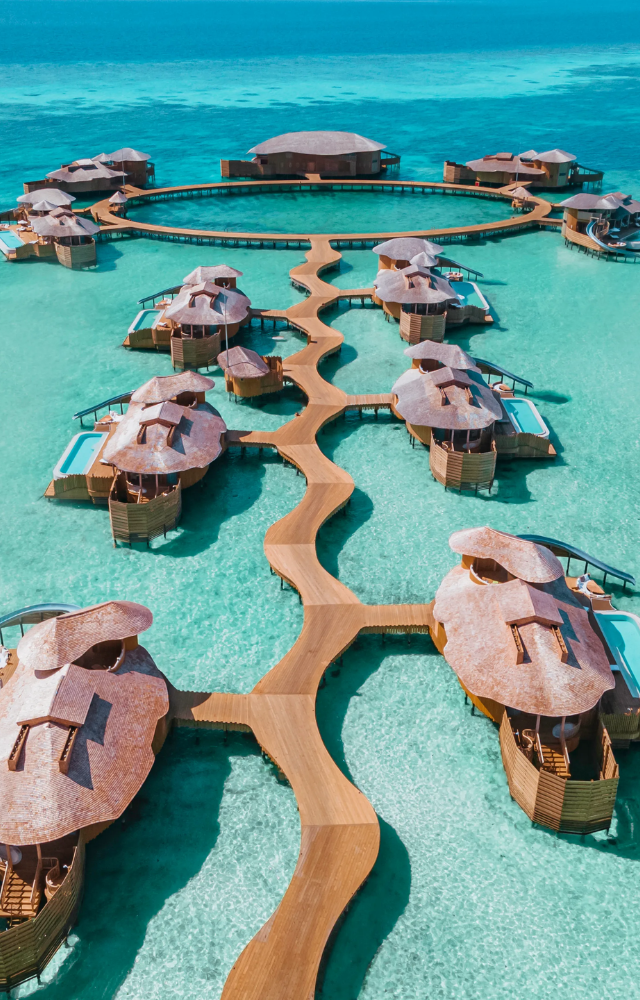 Experience luxury and tranquility in the Maldives, with stunning overwater villas and crystal-clear waters waiting for you.