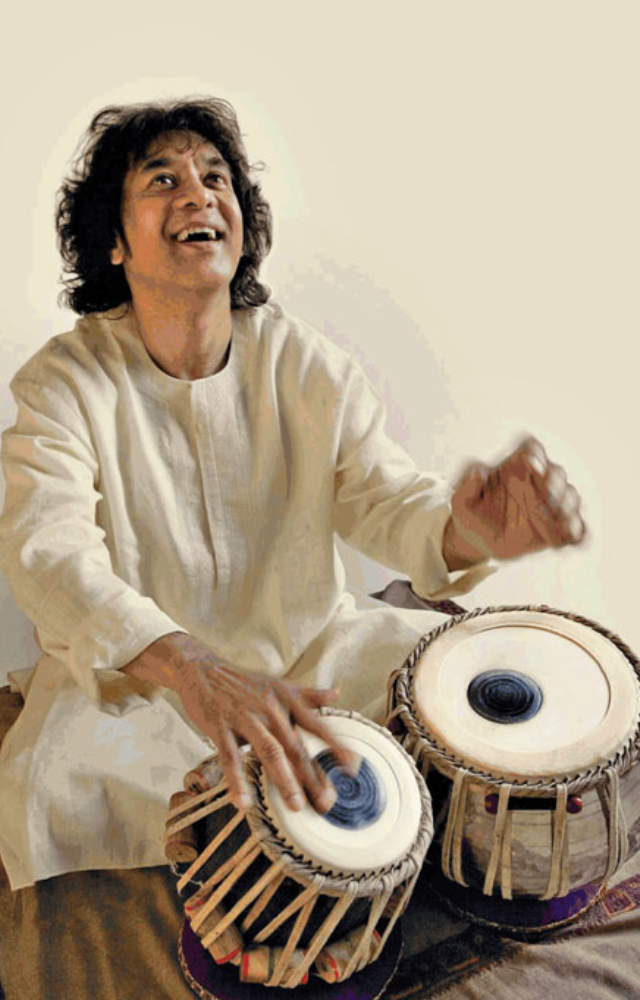 Zakir Hussain, born to legendary tabla maestro Ustad Alla Rakha, grew up in a musical family. His early exposure to rhythm shaped his destiny as a prodigy.
