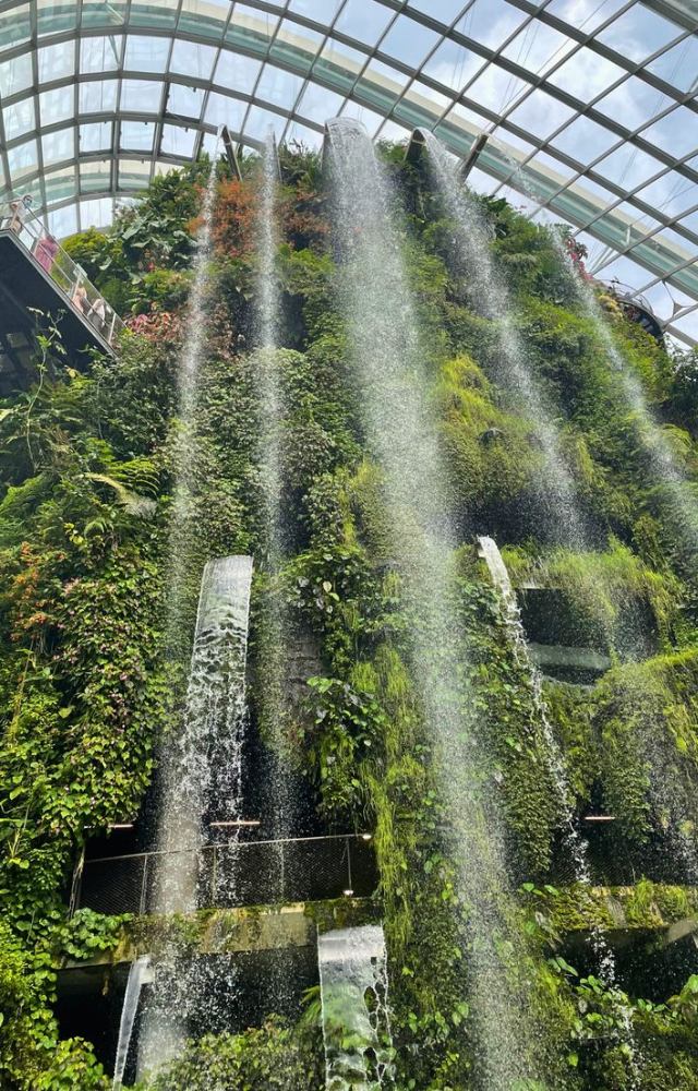 Inside the resort’s shopping mall is a cascading waterfall feature where gondolas float beneath streams of falling water.
