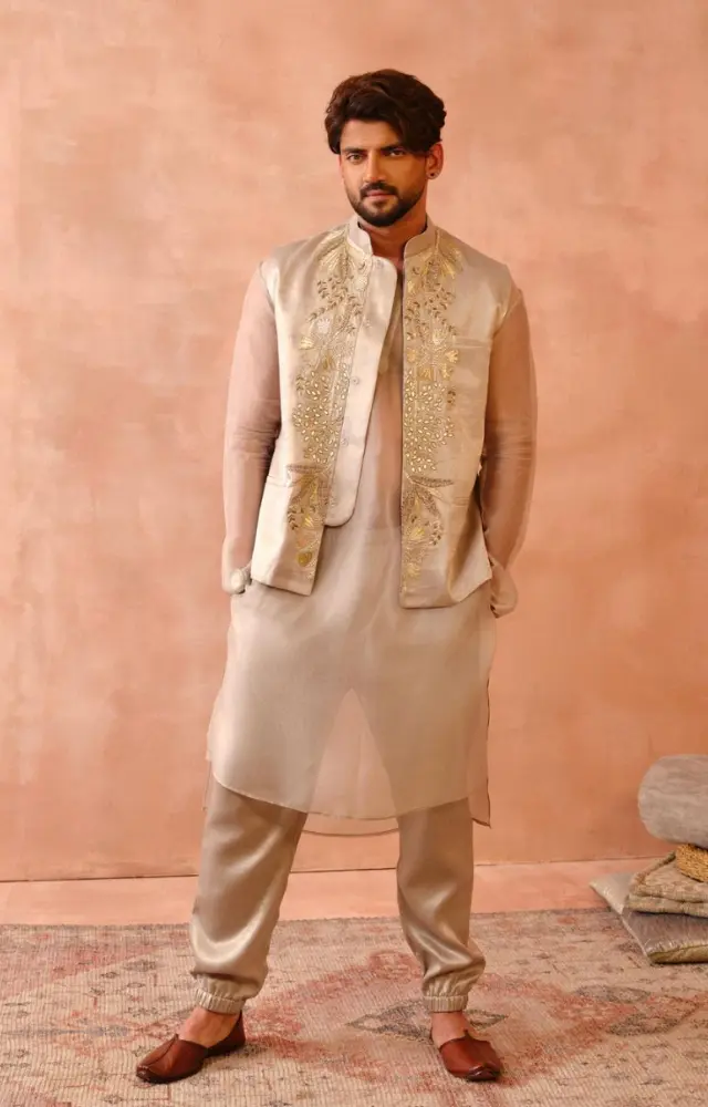 In this look, Zaheer opted for a cream kurta pyjama and paired it with an embroidered jacket